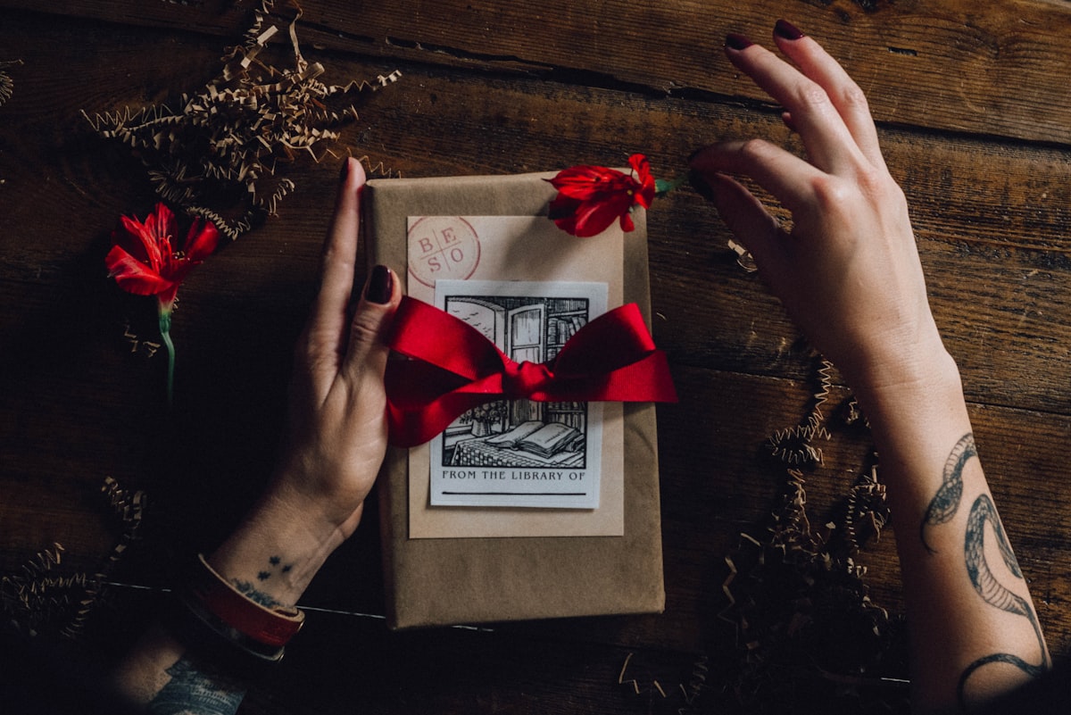 A wrapped gift tied with a red ribbon